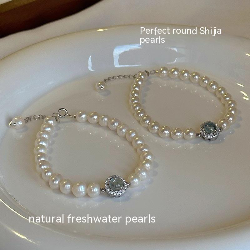 Elegant Essence: Handgemaakte Sterling zilveren armband met Zoetwaterparel &amp; Aquamarijn