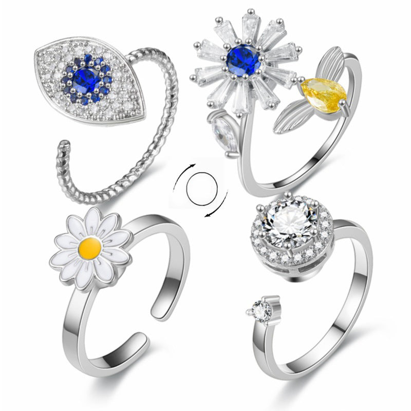 Elegant Spin: Floral & Eye Design Anxiety Relief Ring for Women