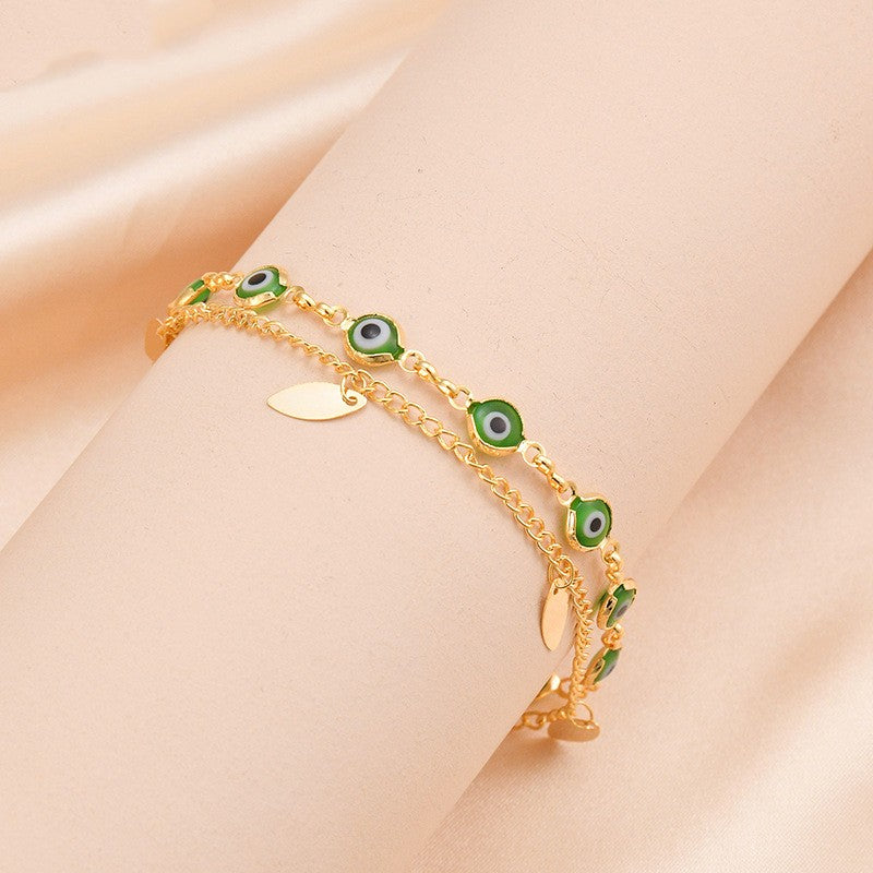 Radiant Elegance: 14K Gold-Plated Stainless Steel Twin Bracelet with Oval Accents